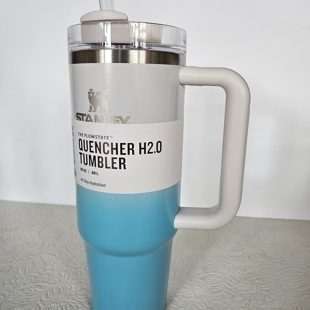 Stanley Quencher H2.0 Tumbler - Blue and White With Pink Accents.